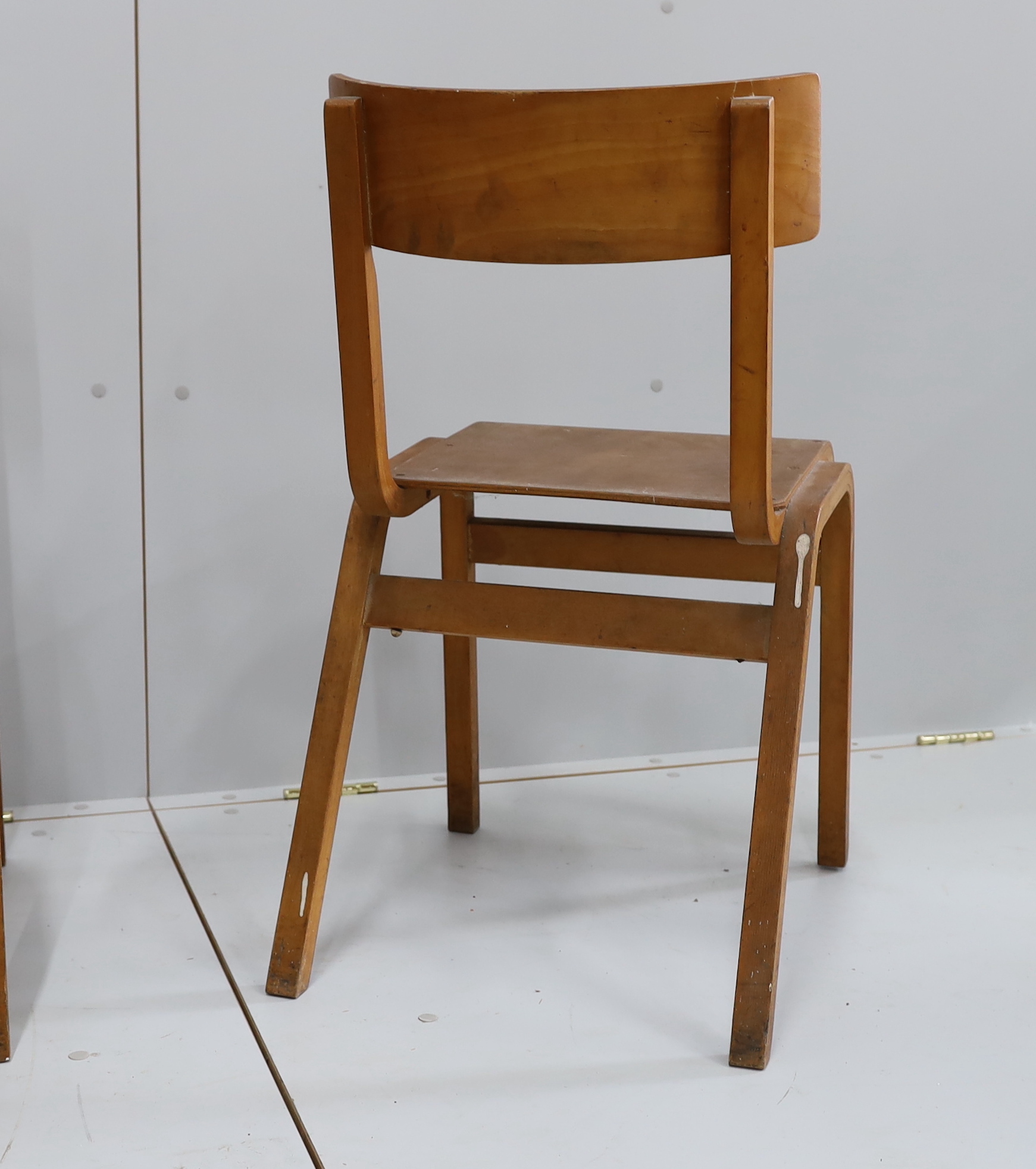 A set of three mid century bent ply chairs